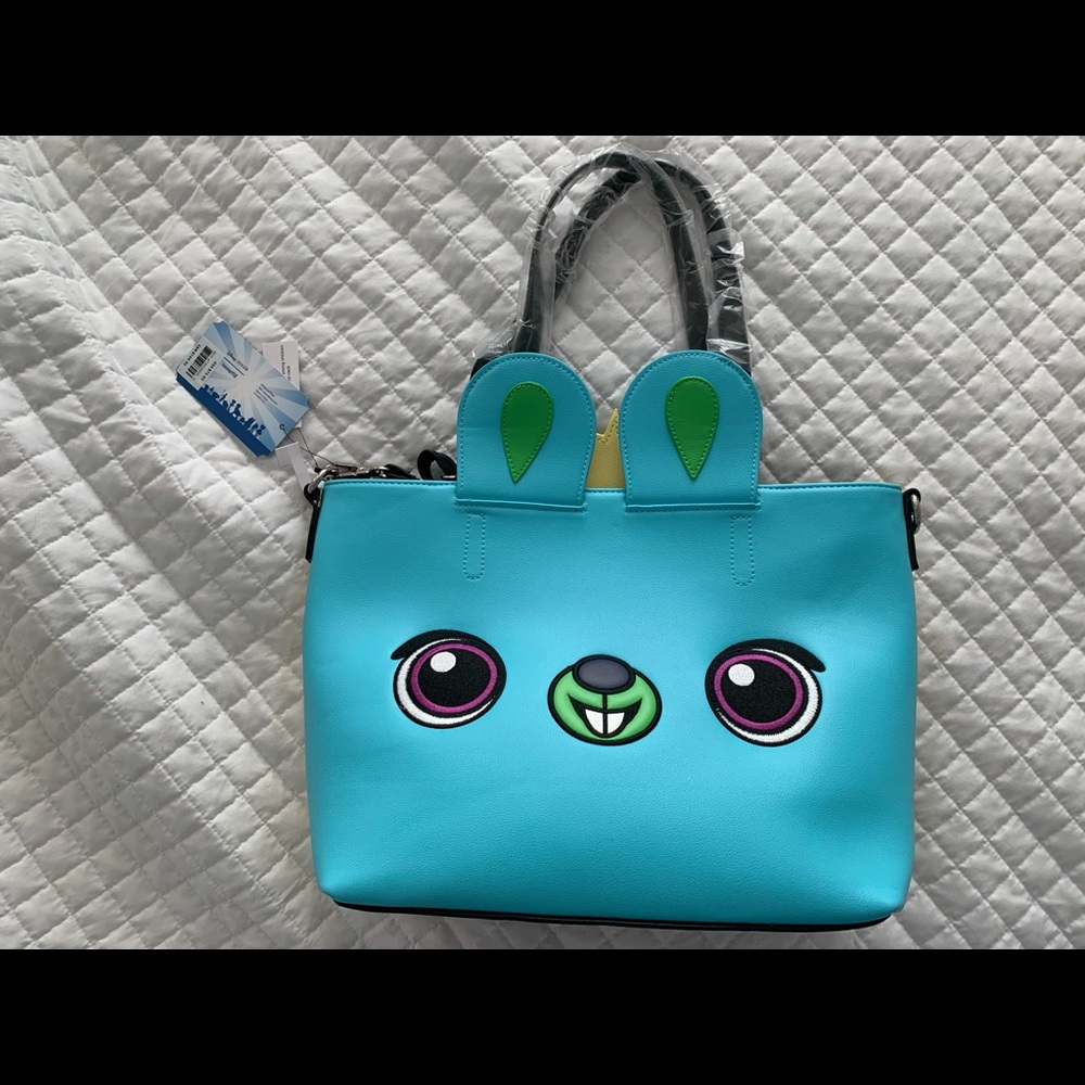 NWT loungefly tote with matching wallet! Toy story